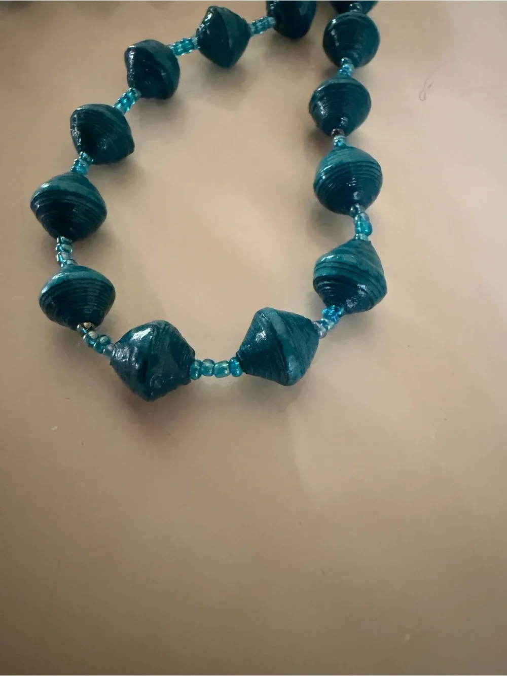 Source Unknown glossy teal